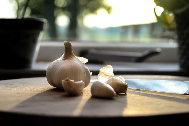Garlic can be thawed at room temperature, placed in a bowl of warm water, or thrown straight into a pan from frozen.