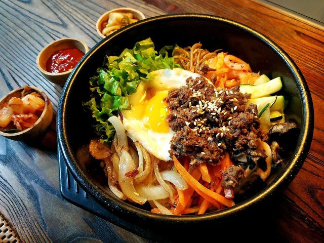 Kimchi is usually used as a condiment to spice up dishes such as bibimbap.