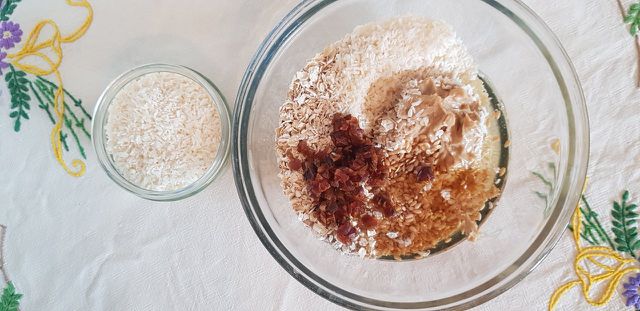 Mix all ingredients together, leaving half of the coconut.