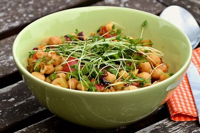 Although many people think of vegan alternatives as healthy, Impossible Burgers have many health disadvantages compared to unprocessed sources of plant protein, such as this chickpea salad.