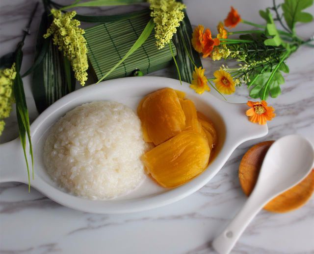The sticky rice will look glossy and shiny when it's ready.
