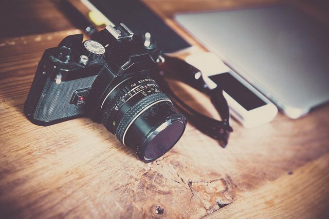 Keep your camera safe while travelling by wrapping it in an old sock. 