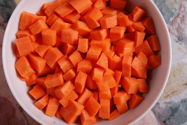 Dicing vegetables to a consistent size helps ensure even cooking time.
