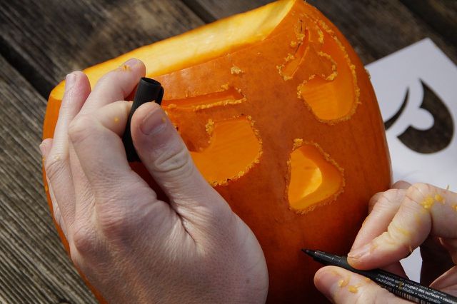 A classic homemade halloween decoration is a carved pumpkin.
