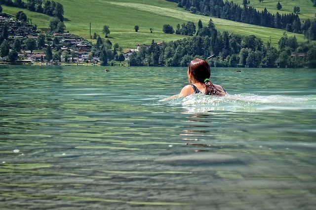 A great reason to try wild swimming is because it helps to boost mood and wellbeing. 