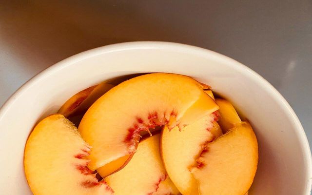 Peeling the peaches for your peach punch means that you have less pulp to strain out. 