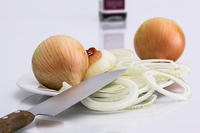 Cooked onion pairs well with a rich pasta sauce.