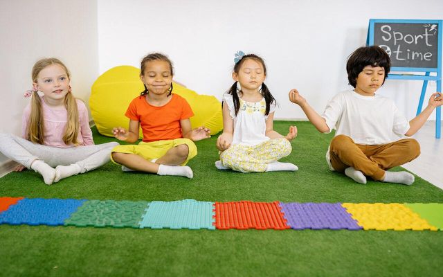 Yoga for children is focused on easy moves and interaction. 