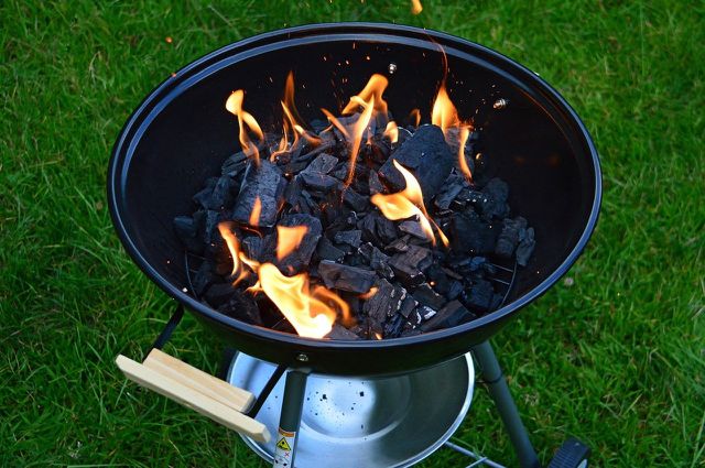 Charcoal emits the most carbon into the air, but does not use as many fossil fuels as propane grills.