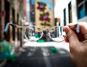 clean glasses held up to see a street