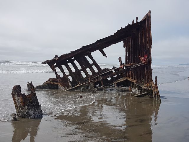 Take in a shipwreck while camping at Fort Stevens State Park.